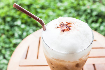 Image showing Refreshing glass of iced blended espresso with milk foam