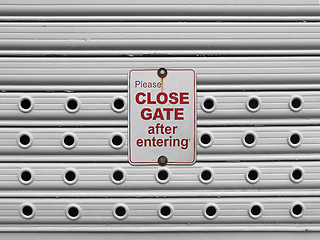 Image showing close roll up gate sign