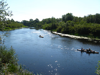 Image showing beautiful landscape with river and canoe on it