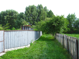 Image showing fence and little street in rural manor