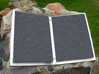 Image showing Stone book on front garden