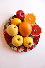 Image showing plate with orange grapefruit and apples