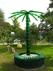 Image showing Palm tree made of bottles from a champagne