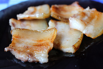 Image showing Tasty fried pieces of lard