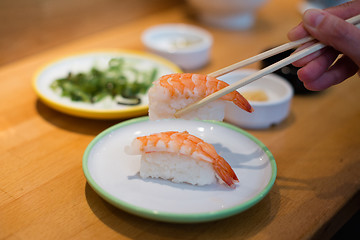 Image showing Eating Sushi