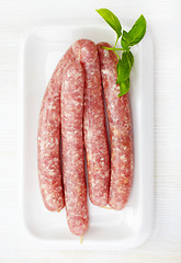 Image showing fresh raw minced meat sausages