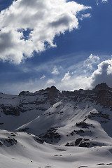 Image showing Snow mountains and blue sky with clouds