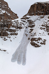 Image showing Snowy rocks and avalanche