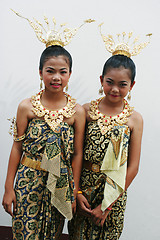 Image showing Girls in bright traditional costume during a parade in Phuket, T