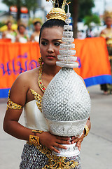 Image showing Woman in bright traditional costume during a parade in Phuket, T