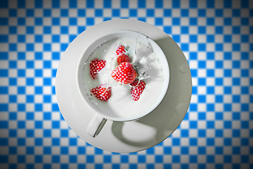 Image showing cup with strawberry splash