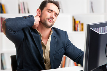 Image showing Casual Businessman With Pain In His Neck