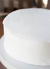 Image showing White cake base decorate with whipped cream 