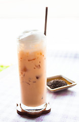 Image showing A glass of cold thai milk tea 