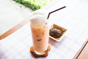 Image showing Refreshment glass of cold thai milk tea 