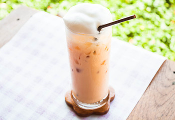 Image showing Tea time with cold thai milk tea 