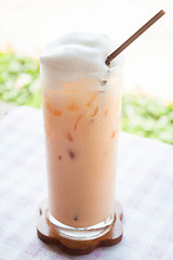 Image showing A glass of iced thai milk tea 