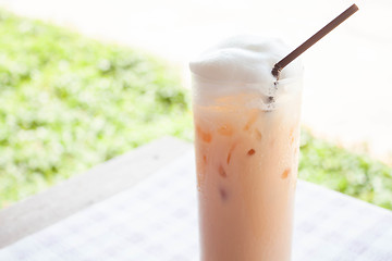 Image showing Fresh glass of iced thai milk tea 