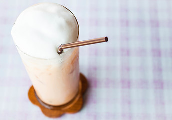Image showing Thai iced tea with milk micro foam
