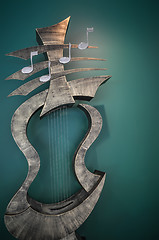 Image showing musical instrument  art statue