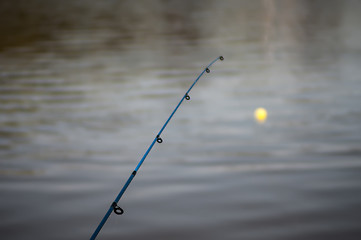 Image showing Fishing Pole - bobber floating in lake