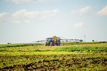 Image showing tractor with dung trailer