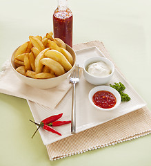 Image showing Potato Wedges And Sour Cream