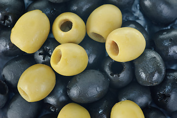 Image showing Abstract background: green and black pitted olives. 