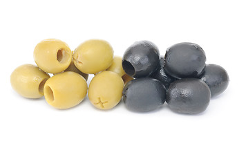 Image showing Some pitted black and green olives isolated on the white background