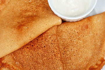 Image showing pancakes with sour cream