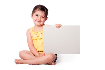 Image showing Happy girl sitting with whiteboard