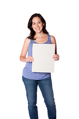 Image showing Happy woman hoding whiteboard