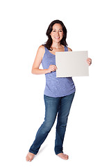 Image showing Happy woman hoding whiteboard