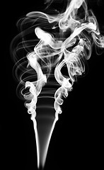 Image showing Abstract white smoke swirls on black 