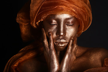 Image showing Stunning African Amercian Woman Painted With Gold 