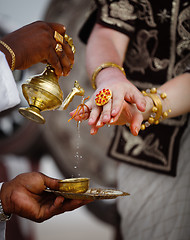 Image showing Wedding in Sri Lanka - ritual watering fingers