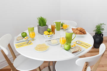 Image showing Round table with tasty breakfast
