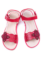 Image showing pair of a little girl's red shoes