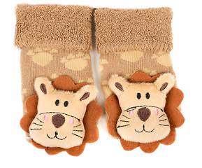 Image showing pair of children's sneakers with a muzzle of a lion