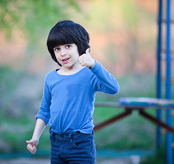 Image showing smiling black-haired boy