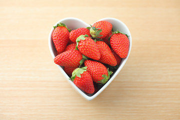 Image showing Strawberry in heart shape bowl