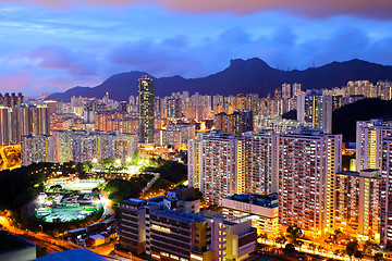 Image showing Kowloon area in Hong Kong at night with lion rock