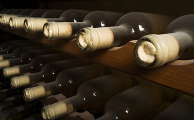 Image showing Wine bottles on shelf