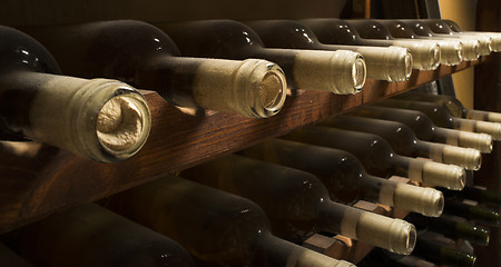 Image showing Wine bottles on shelf