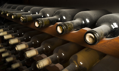 Image showing Wine bottles on shelf