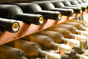 Image showing Wine bottles on shelf