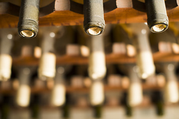 Image showing Wine bottles on shelf