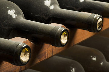 Image showing Wine bottles on shelf