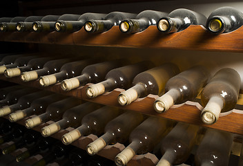 Image showing Wine bottles on shelf