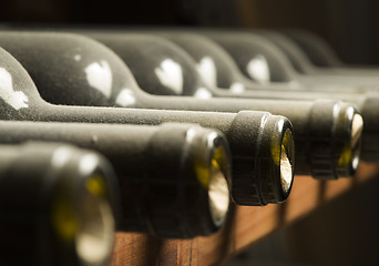 Image showing Wine bottles on shelf